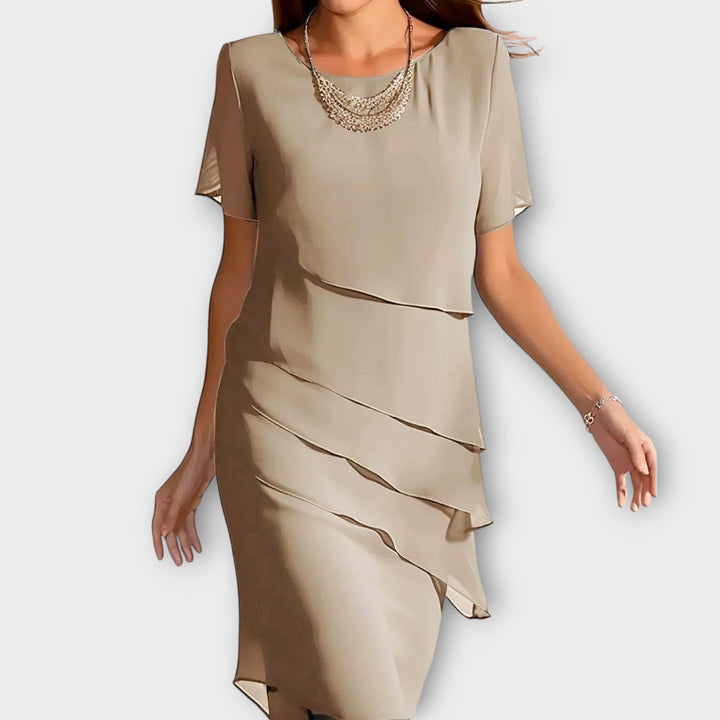 Ione - Ruffle Detail Irregular Hem Tummy Cover Dress
